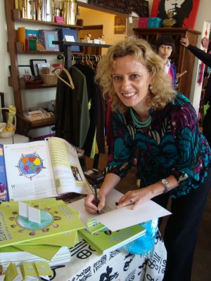 Lucinda signing books!