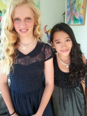Diana & Alexine wearing their friendship necklaces Alexine's mother bought for them when Alexine departed Beijing when they were 7 years old.